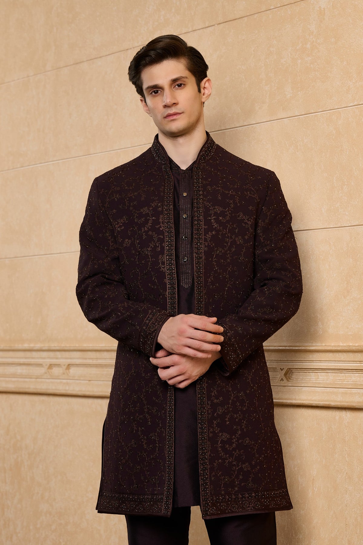 Deep burgundy embroidered men's sherwani with ornate gold detailing