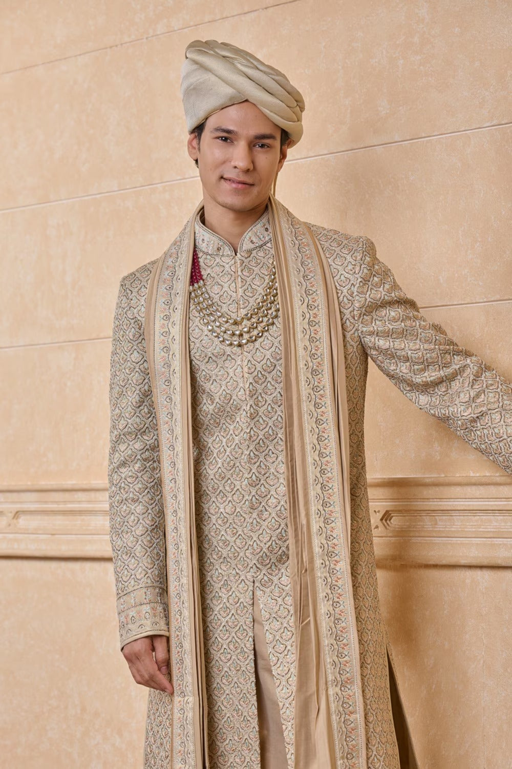 Champagne gold patterned embroidered men's sherwani with matching stole and turban